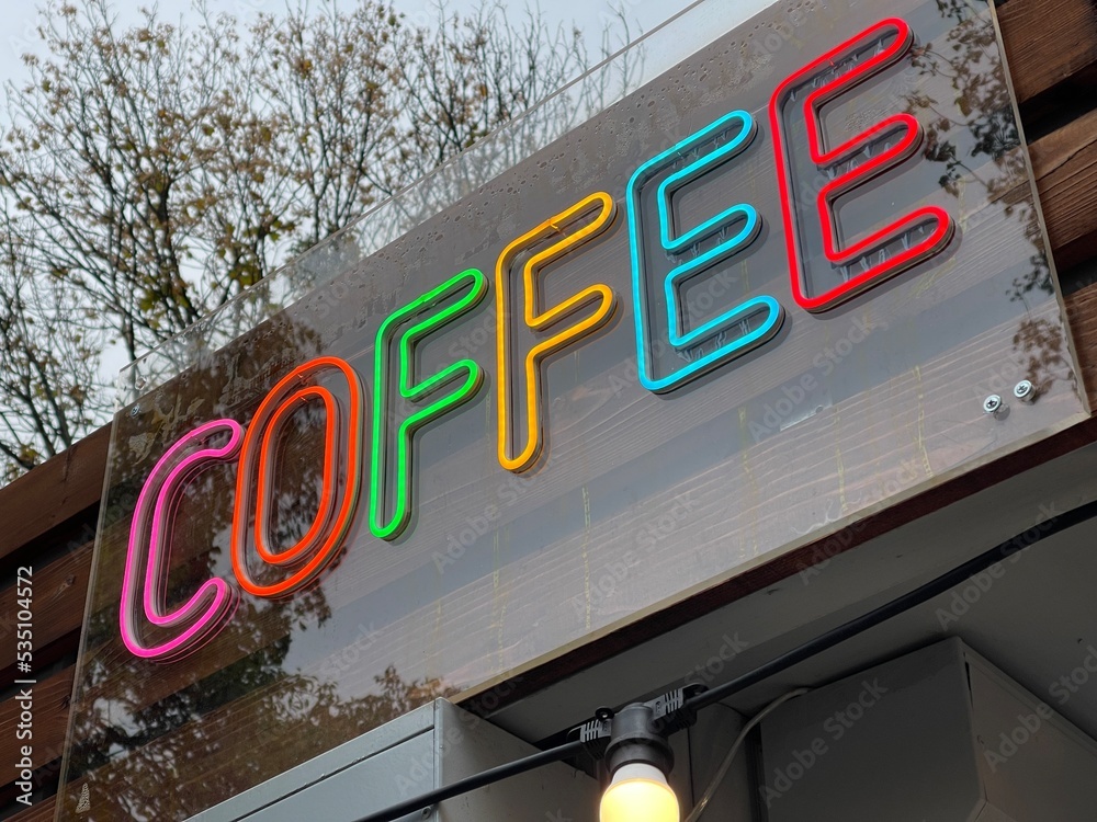 Fototapeta premium Low angle close up of coffee shop neon sign