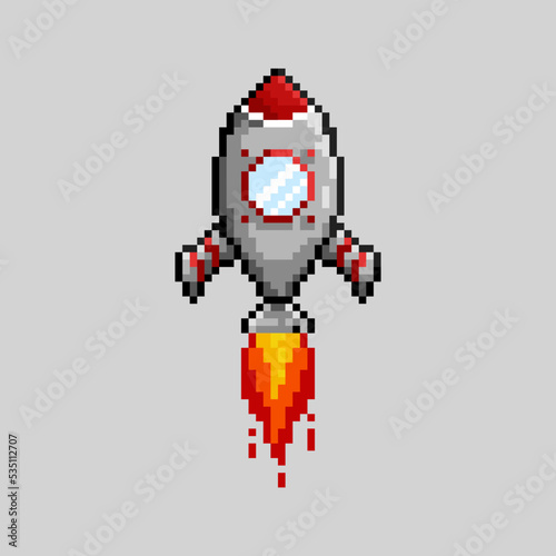 Pixel art rocket launch. Spaceship icon in retro style. Isolated vector illustration.
