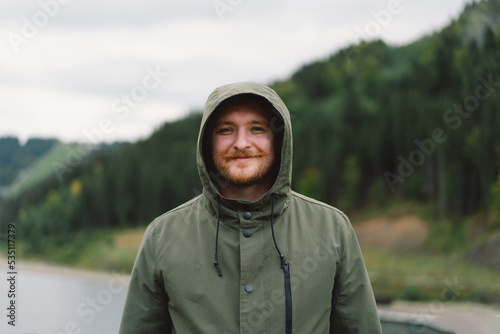 Portrait of Young happy male in the forest. Wellness concept and holistic rest. Portrait of a traveler © Анастасія Стягайло