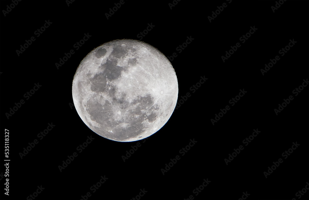 Full moon on the dark night / The Moon is an astronomical body that orbits planet Earth, being Earth's only permanent natural satellite Full moon on the dark night / The Moon is an astronomical body that orbits planet Earth, being Earth's only permanent natural satellite