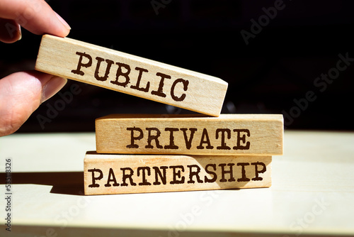 Wooden blocks with words 'Public-Private Partnership'.