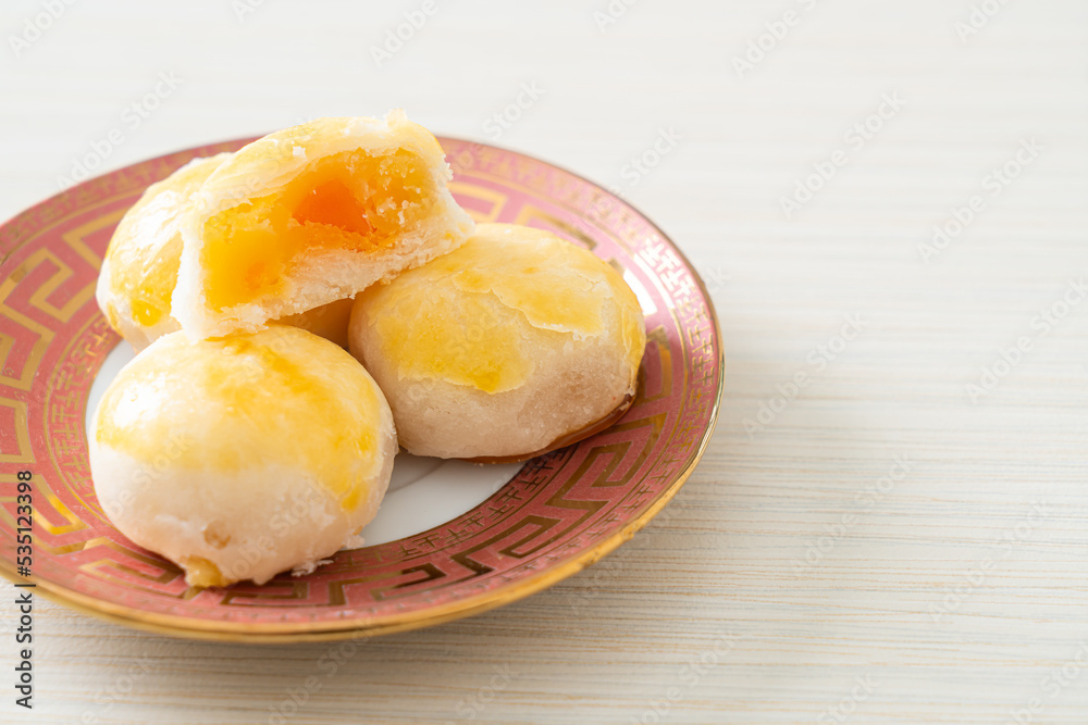 Chinese pastry moon cake with salted egg peanut or Spring Roll pastry with nuts and salted eggs