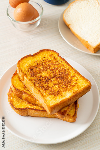 french toast on white plate