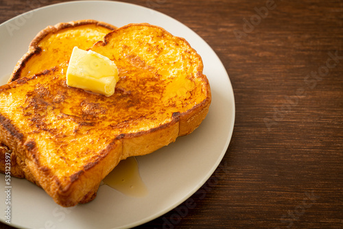 French toasted with butter and honey