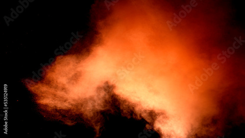 Scene glowing orange, red smoke. Atmospheric smoke, abstract color background, close-up. Royalty high-quality free stock of Vibrant colors spectrum. Orange, red mist or smog moves on black background