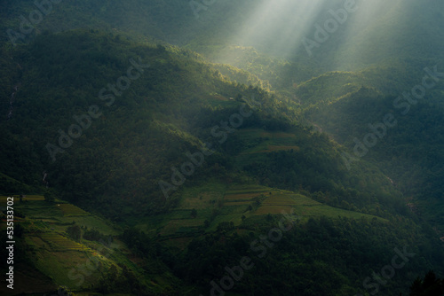 Aerial view of golden rice terraces at Mu cang chai town near Sapa city, north of Vietnam. Beautiful terraced rice field in harvest season in Yen Bai, Vietnam