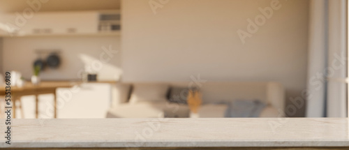 Empty space on minimal white tabletop over blurred minimal living room in the background