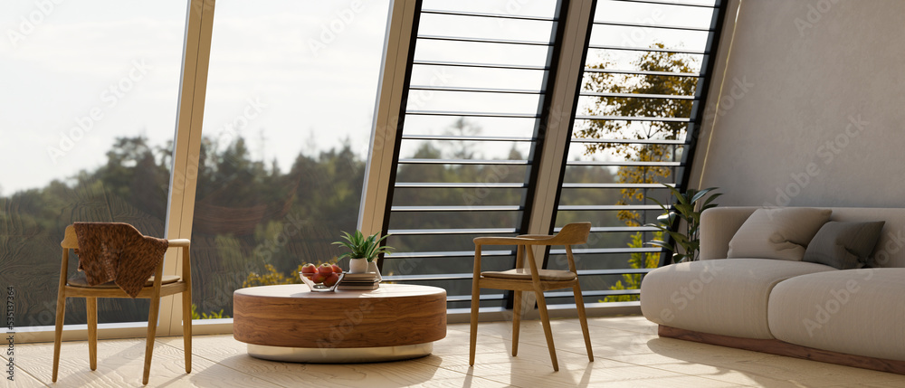 Modern contemporary living room near the window with couch, round coffee table, armchairs Modern contemporary living room near the window with couch, round coffee table, armchairs