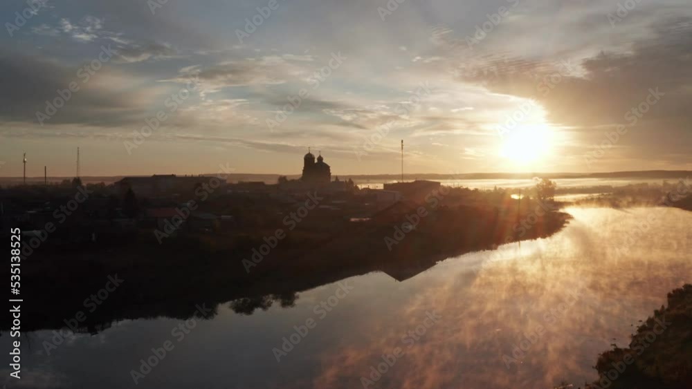 Flying over the river in the village at dawn Flying over the river in the village at dawn