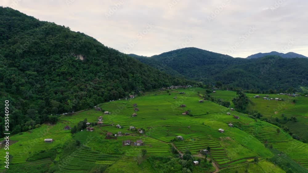 Aerial view in an amazing terraced rice Ban pa bong piang in Chiang mai, Thailand. High mountain rice farming is also a famous tourist destination for tourists. Footage b roll 4k. Aerial view in an amazing terraced rice Ban pa bong piang in Chiang mai, Thailand. High mountain rice farming is also a famous tourist destination for tourists. Footage b roll 4k.