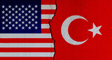 American and Turkish flags on broken cracked wall