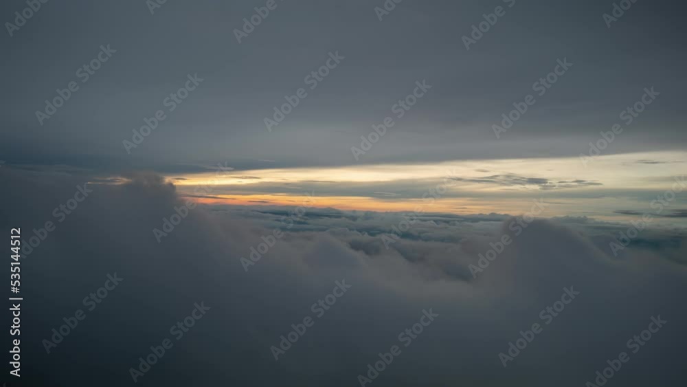 Timelapse foggy or over the clouds while sunrise sky. A sea of fog is formed from stratus. Foggy valley mount ridge nature. Time lapse Beautiful foggy and cloudy slow moving Aerial view Footage B-roll Timelapse foggy or over the clouds while sunrise sky. A sea of fog is formed from stratus. Foggy valley mount ridge nature. Time lapse Beautiful foggy and cloudy slow moving Aerial view Footage B-roll
