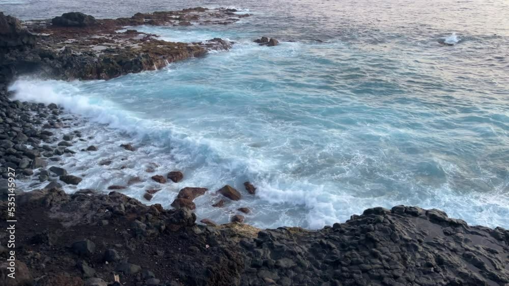 Scenic rocky coast nature background with ocean waves in the evening. Nature of Tenerife. 4K Scenic rocky coast nature background with ocean waves in the evening. Nature of Tenerife. 4K