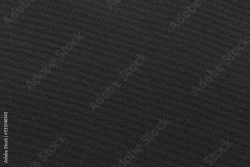 Black color fabric cloth polyester texture and textile background.