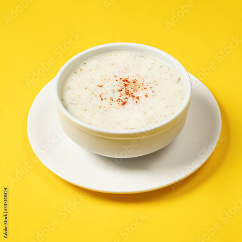 pumpkin soup in a white bowl 