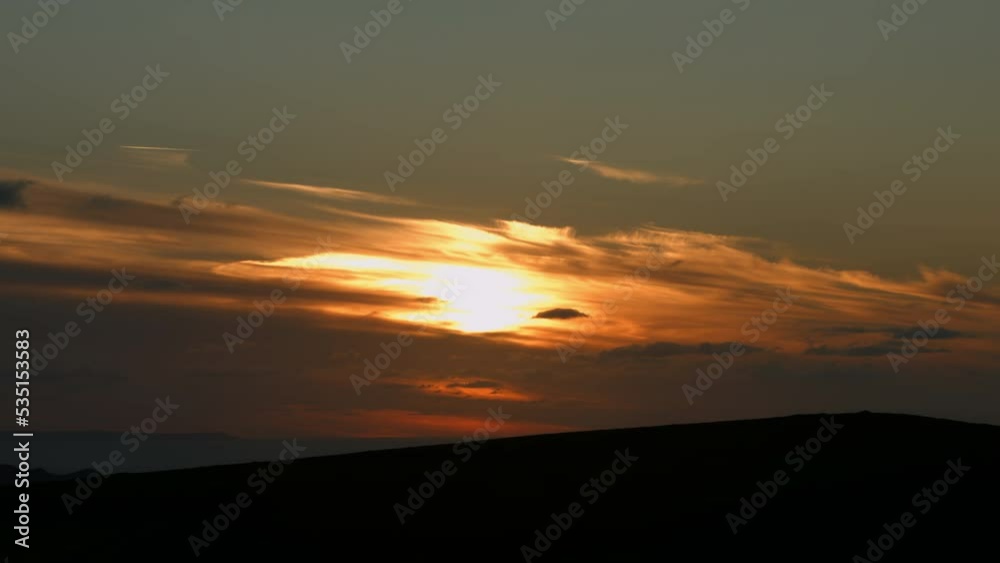 Beautiful Sunset Timelapse Over Coastal Mountain with Dramatic Cloudscape and Planes in North Devon UK 4K