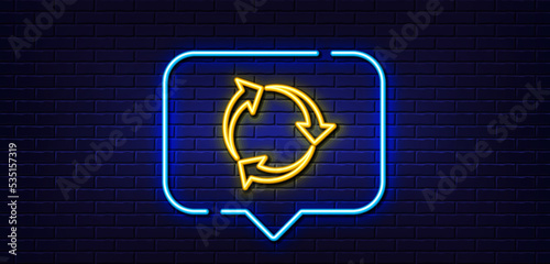 Neon light speech bubble. Recycle arrow line icon. Recycling waste symbol. Reduce and Reuse sign. Neon light background. Recycle glow line. Brick wall banner. Vector