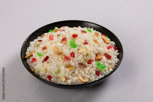 Kachchi Biriyani, chicken biriyani, prawn biriyani, Dhaka style biriyani, plain polau cooked by aromatic rice or chinigura rice isolated on white background. photo