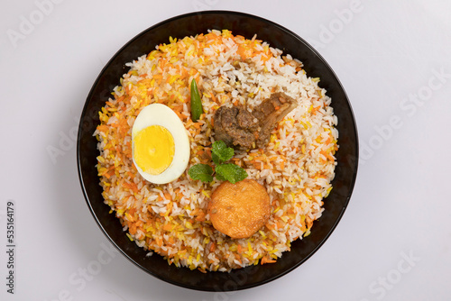 Kachchi Biriyani, chicken biriyani, prawn biriyani, Dhaka style biriyani, plain polau cooked by aromatic rice or chinigura rice isolated on white background.