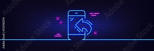 Neon light glow effect. Call center service line icon. Incoming phone call sign. Feedback symbol. 3d line neon glow icon. Brick wall banner. Incoming call outline. Vector