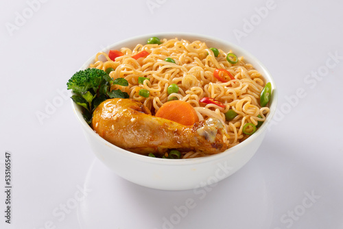 Bowl of noodles on white background