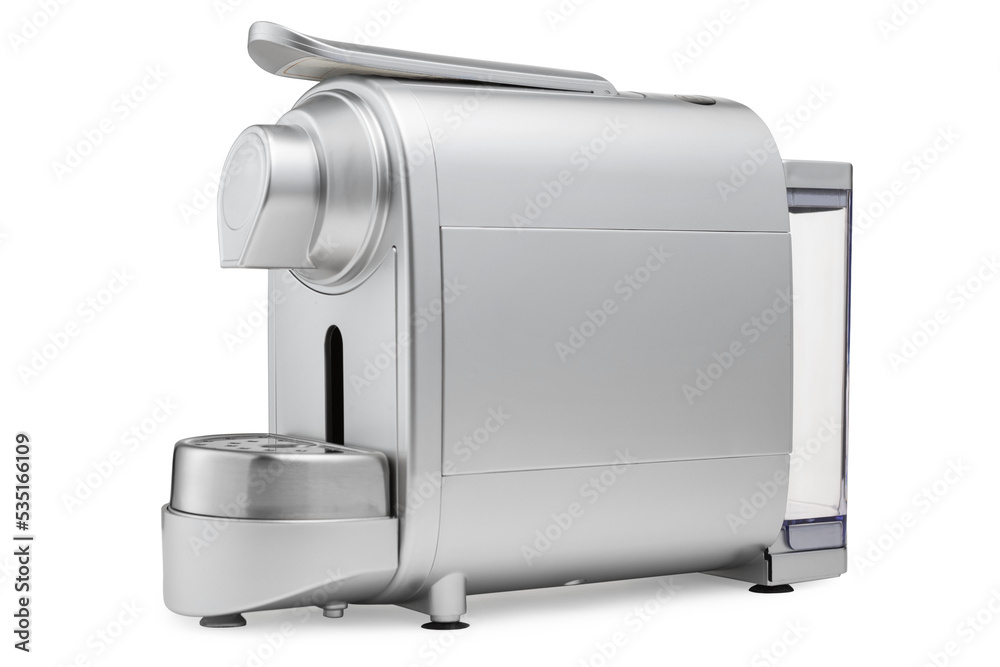 Silver electric coffee machine, for making capsule coffee, on a white background, diagonal arrangement, isolate Silver electric coffee machine, for making capsule coffee, on a white background, diagonal arrangement, isolate