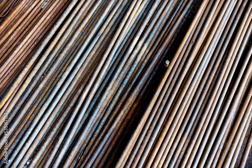 Round steel bars on pile in the warehouse