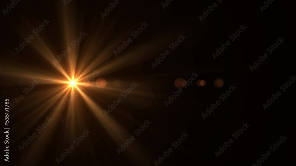 lens flare effect on black background Stock Video | Adobe Stock