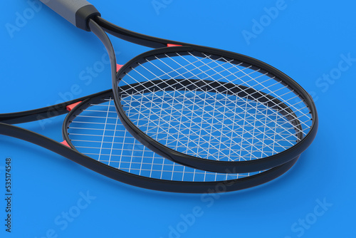 Black tennis racquets on blue background. Sports equipments. International tournament. Game for laisure. Favorite hobby. 3d render