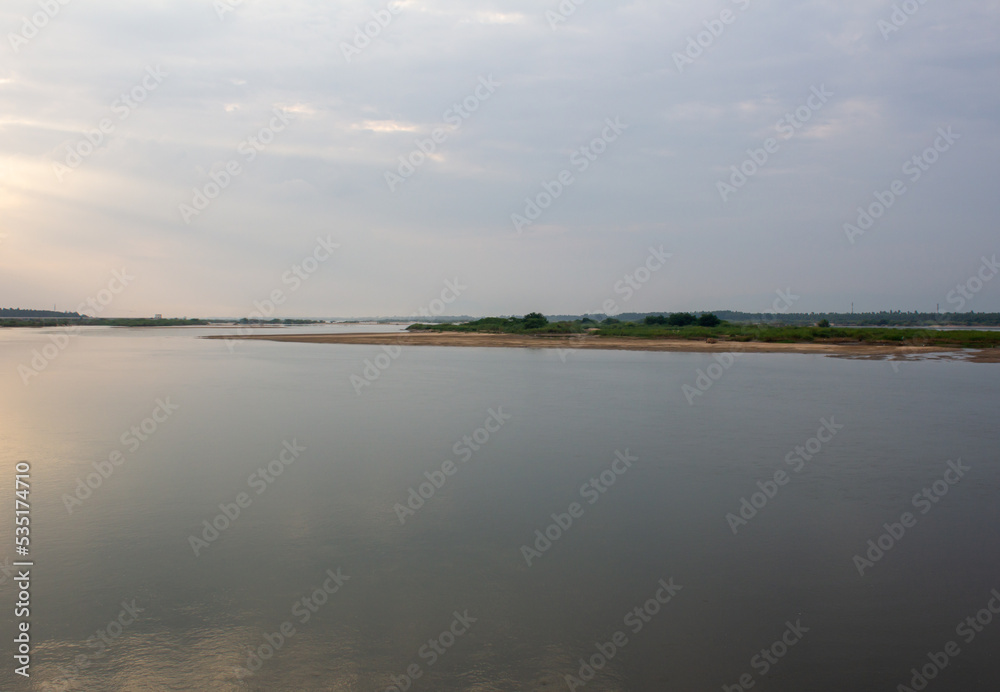 Beautiful View of kaveri river from upper anaicut during sunset. View from Mukkombu dam, Trichy