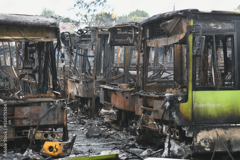 Burnt buses after a missile attack on the city of Dnipro, Ukraine. Burnt buses after a missile attack on the city of Dnipro, Ukraine.