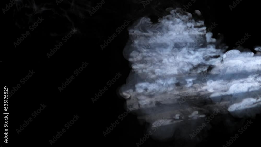 single puff of real smoke in front of a light ray of a professional light setup in studio for overlay use in 60 fps for slowmo single puff of real smoke in front of a light ray of a professional light setup in studio for overlay use in 60 fps for slowmo