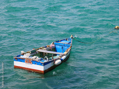 Colourful old fishing boat on the sea