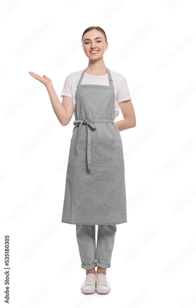 Beautiful young woman in clean apron on white background Beautiful young woman in clean apron on white background