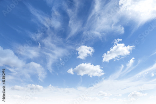 Picturesque blue sky with white clouds on sunny day