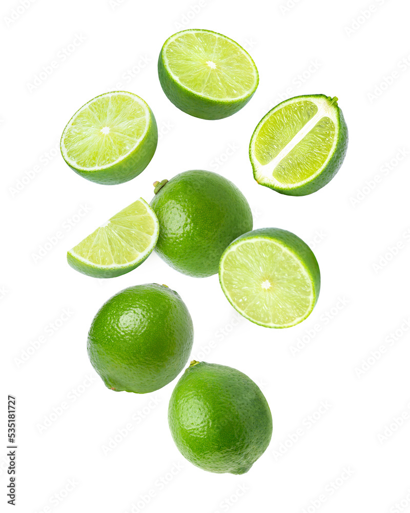 Lime with cut half slice levitate isolated on white background.