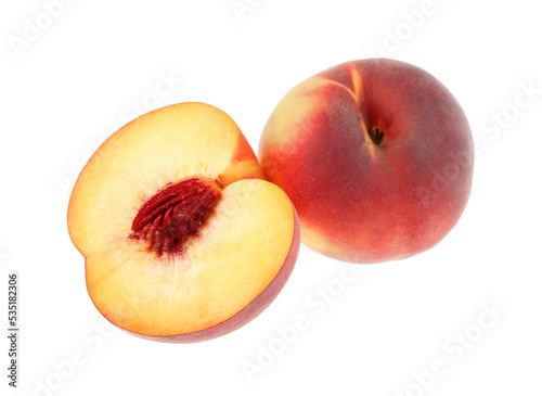 Whole and cut ripe peaches isolated on white
