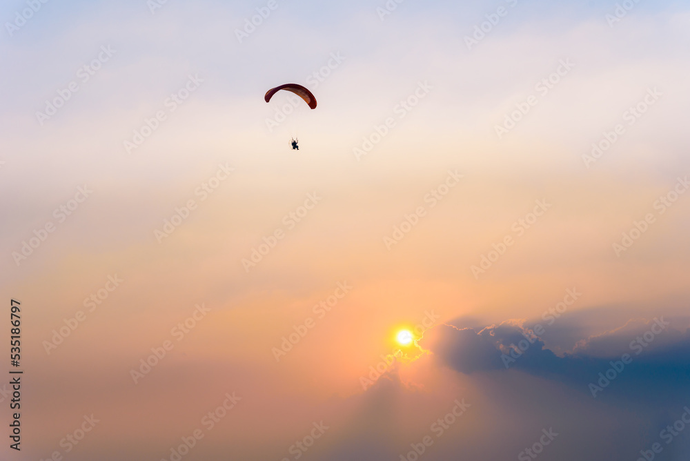 Paramotor flying on the sky, Paramotor flying on the sky ,adventure man active extreme sport pilot flying in sky with paramotor