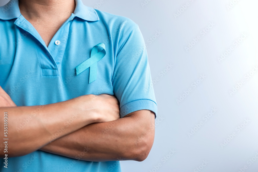 Blue November Prostate Cancer Awareness month, Man in blue shirt with Blue Ribbon for support people life and illness. Healthcare, International men, Father, Diabetes and World cancer day - obrazy, fototapety, plakaty 