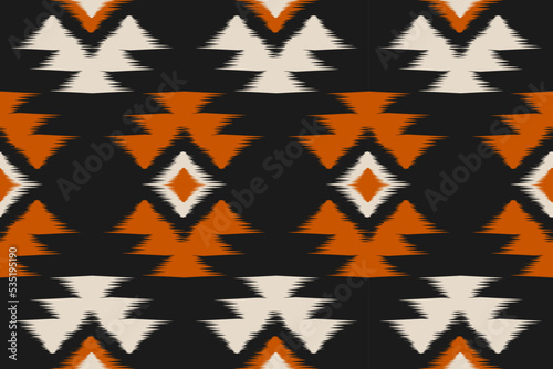 Ethnic ikat seamless pattern in tribal. Aztec geometric ethnic ornament print. Ikat pattern style. Design for background, wallpaper, illustration, fabric, clothing, carpet, textile, batik, embroidery.