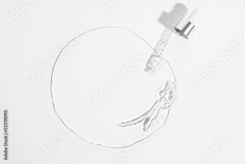 Laboratory equipment with advertising backgrounds. Medical flasks, bowls. Chemical laboratory research of cosmetics. Serums for the face.