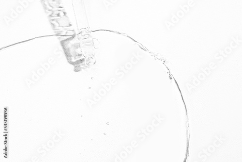 Laboratory equipment with advertising backgrounds. Medical flasks, bowls. Chemical laboratory research of cosmetics. Serums for the face.