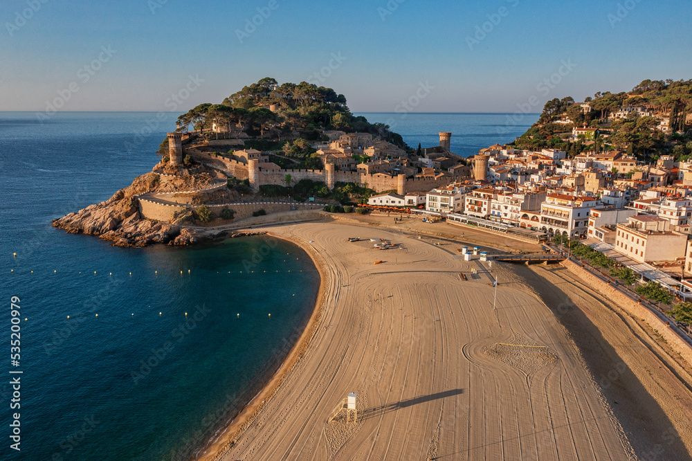 Aerial view to beautiful fortress and beach in Lloret de Mar on Costa Brava, Spain