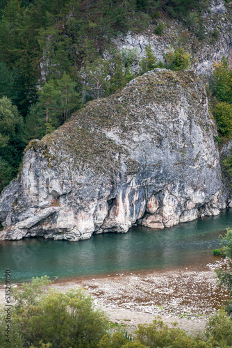 Aerial view of the Beautiful Rock located by the river itself. The gorge of the Białka River. Rocks covered with trees