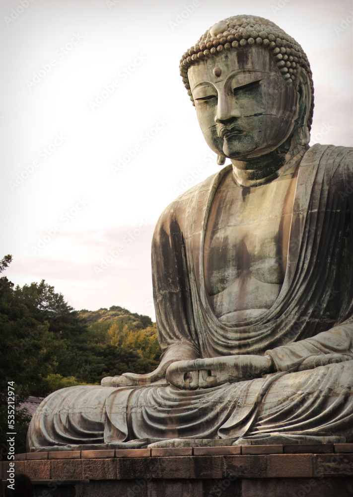 The Great Buddha on the grounds of Kotokuin Temple in Kamakura, Japan. The Great Buddha on the grounds of Kotokuin Temple in Kamakura, Japan.