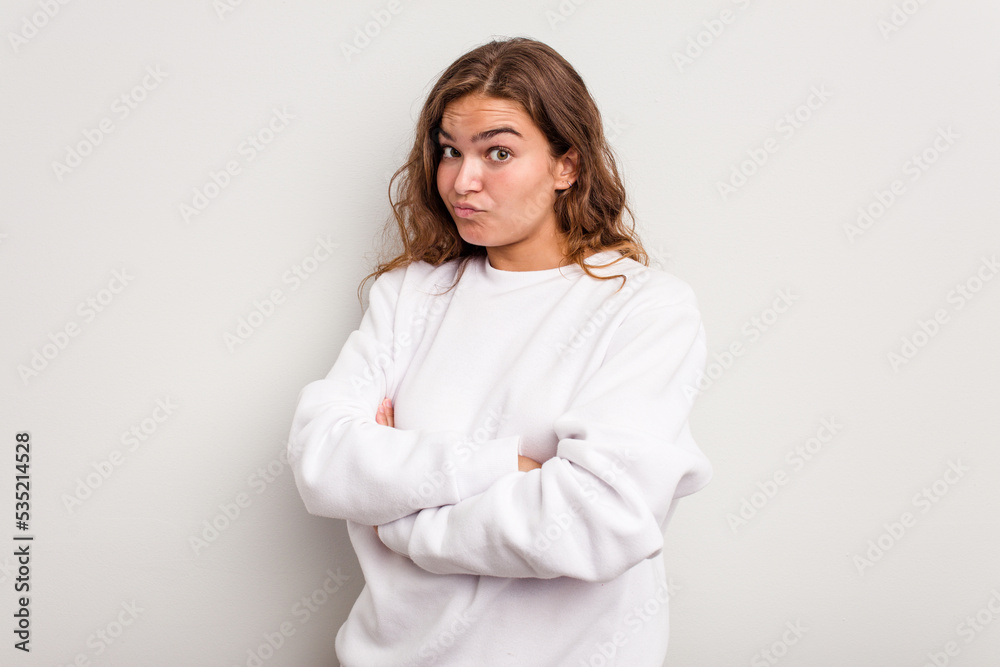 Young caucasian woman isolated on blue background unhappy looking in camera with sarcastic expression. Young caucasian woman isolated on blue background unhappy looking in camera with sarcastic expression.