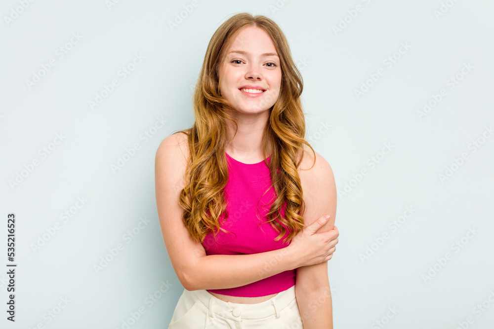 Portrait of pretty young caucasian woman isolated on blue background Portrait of pretty young caucasian woman isolated on blue background