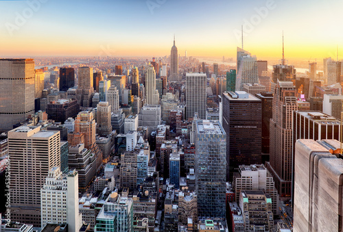 Sunset aerial view of New York City looking over midtown Manhattan towards downtown. © TTstudio
