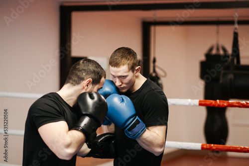 Boxers train in the ring and in the gym © andriyyavor