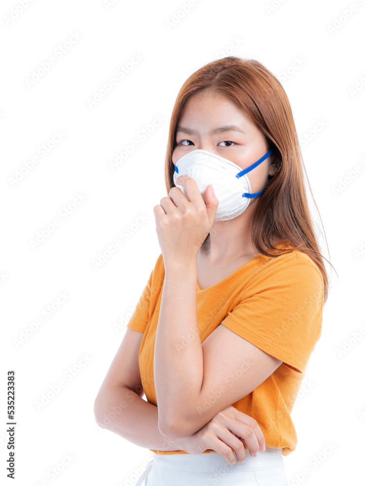 Asian girl wearing protective face mask for protection during the quarantine Coronavirus covid19 outbreak on white background , protect spread Covid-19 Asian girl wearing protective face mask for protection during the quarantine Coronavirus covid19 outbreak on white background , protect spread Covid-19